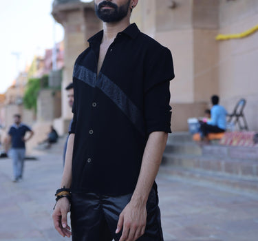 BLACK SHIRT WITH SNAKE PRINT FABRIC DETAILING